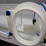 Multiwell Plate Transfer Tray - Showing how it moves into the workstation