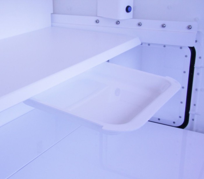 Internal storage tray