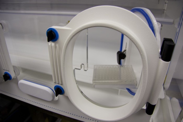 Multiwell Plate Transfer Tray - Showing how it moves into the workstation